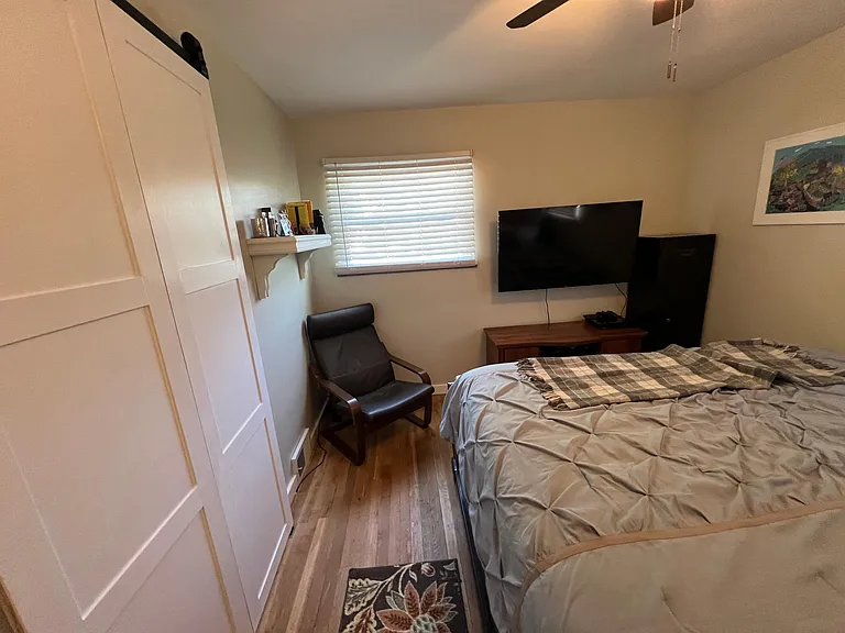 Primary Bedroom with Bifold Closet Barn Doors