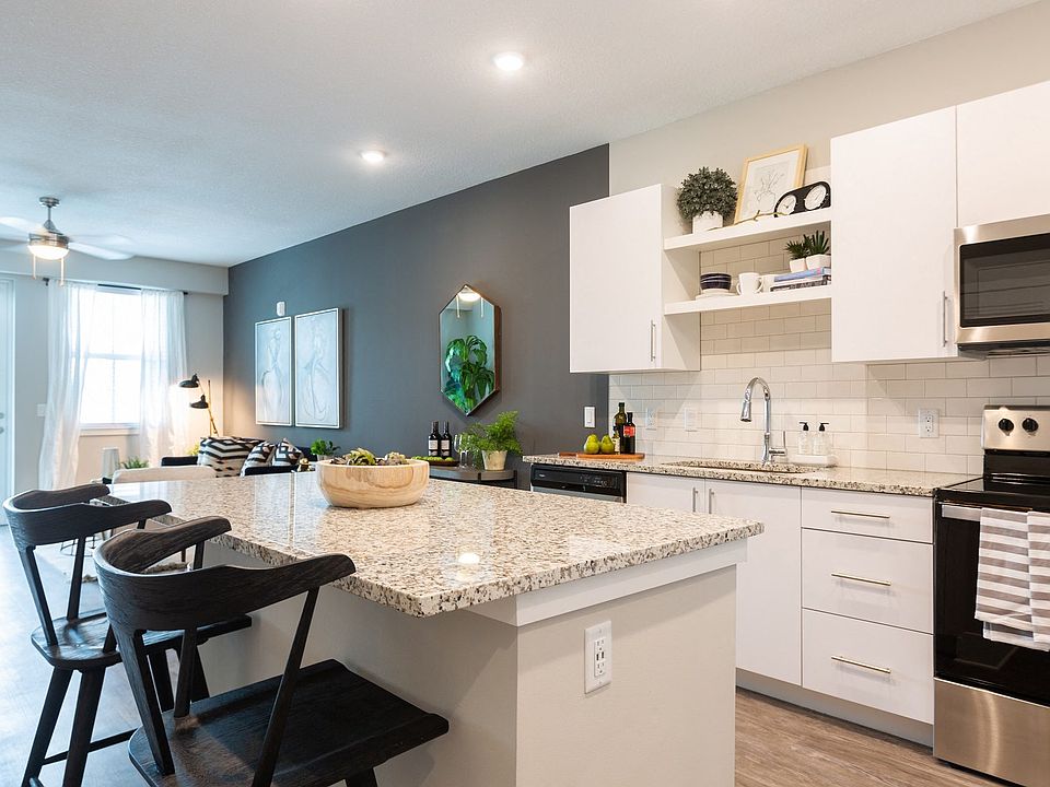 Gourmet kitchens include a Chef's island and pantry.