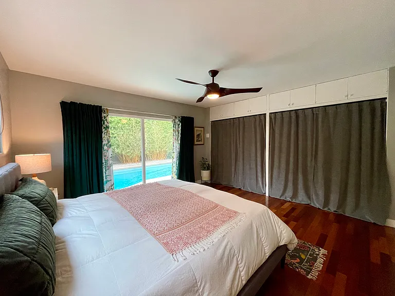Primary suite with double closets with built-in system and ample overhead storage