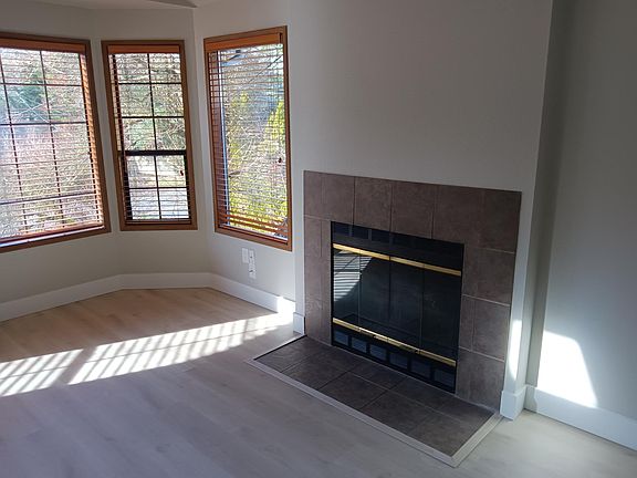Wood fireplace in living room