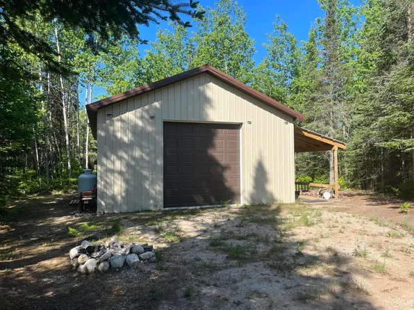 W Huckleberry Lake Rd, Trout Lake, MI 49793