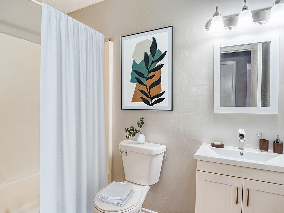 white bathroom toilet sink mirror