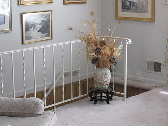 Cut-Through Staircase to a 1,000 sq.ft.Finished Walk Out Basement