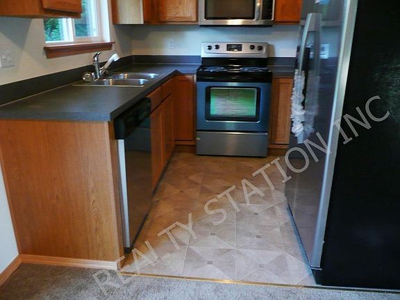 updated kitchen with stainless appliances