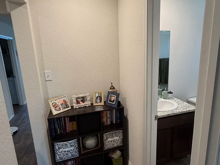 Entry to guest bathroom and first bedroom