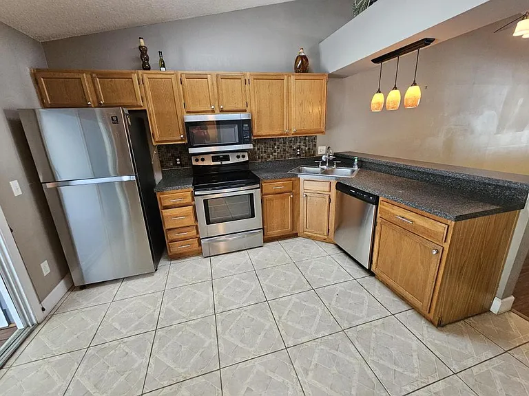 5477 Lake Margaret Dr #F — Photo 20