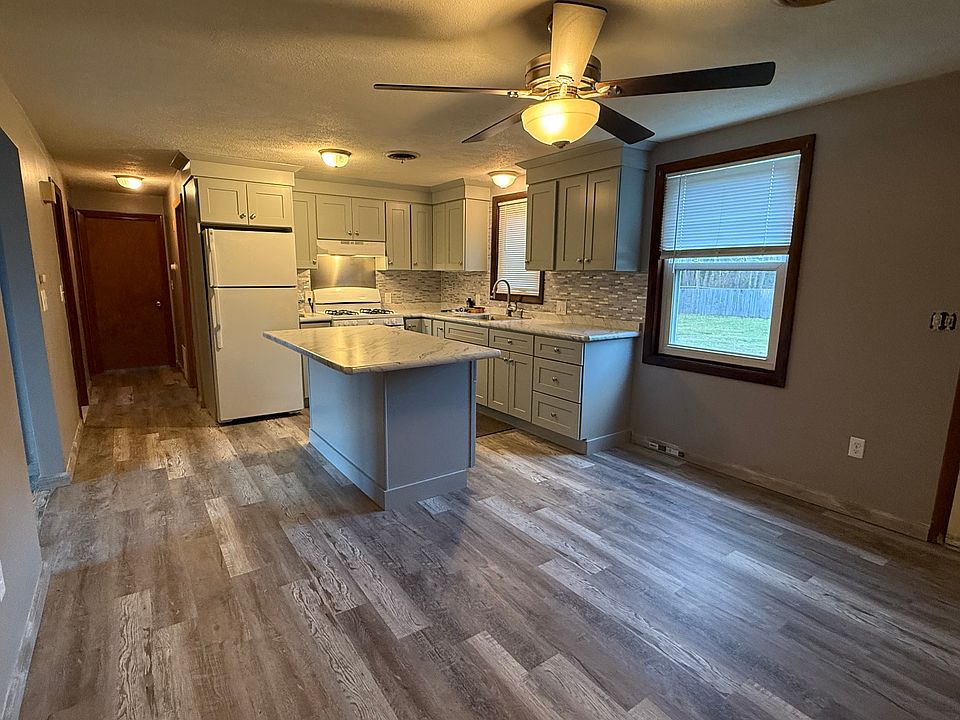 All New cabinets and new island all new flooring throughout!