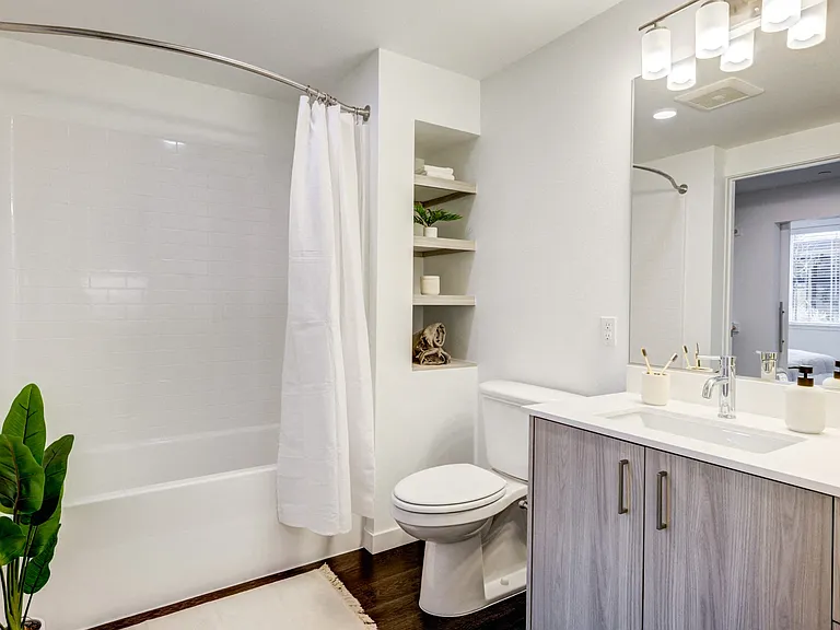 Enjoy plenty of extra storage with custom cabinetry and built in linen shelves.
