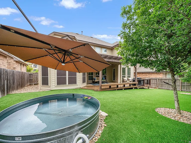 Backyard - Cowboy Pool. Includes pool pump and umbrella for adult and kid play.
