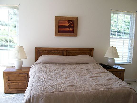 Master suite on main floor with full bath and sliders to deck.