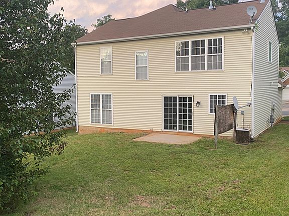 Rear view, spacious backyard