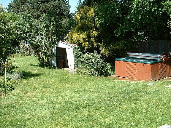 backyard with hot tub