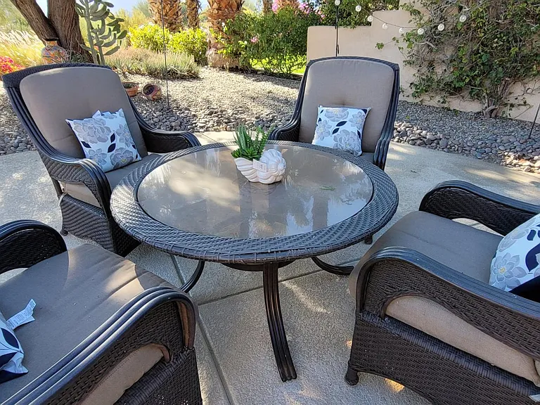 Large patio with 3 umbrellas, lounge chairs, dining table, BBQ, scenic views spectacular property!