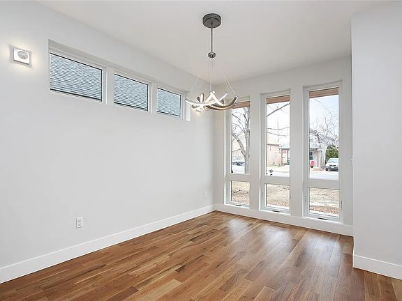 Dining room. Window coverings have been installed on all windows
