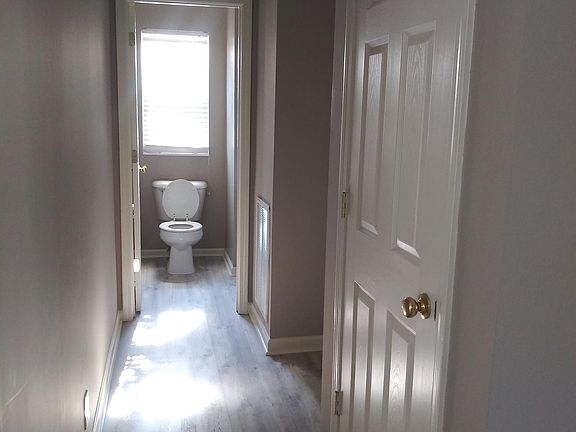 Downstairs hallway / small closet and entrance to the garag