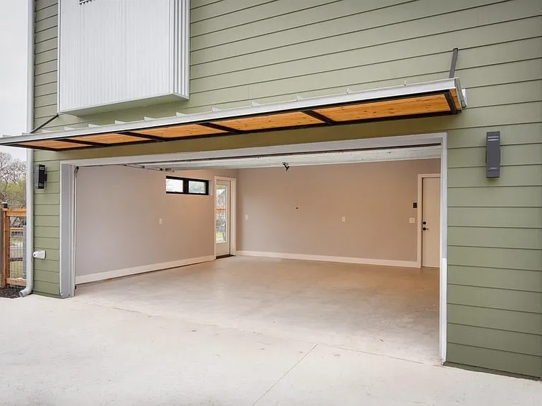 An extra-large two-car attached garage will open to the kitchen.