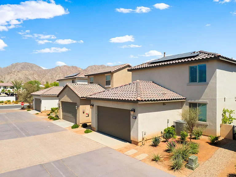 The home features a 1-car garage and parking for two more right in front of the home.