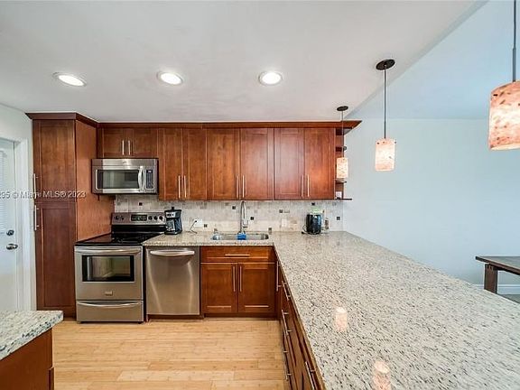 5th image of 3050 N Palm Aire Dr APT 401