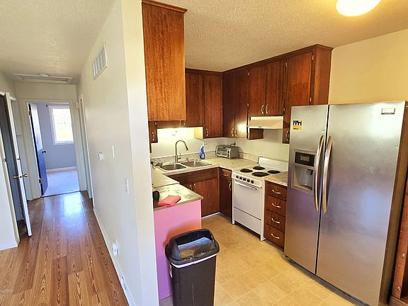 Kitchen and hallway looking toward bedrooms