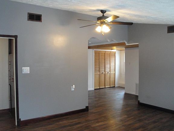 Living room with vaulted ceiling