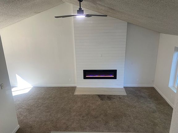 Broader view of the main living room from stairs