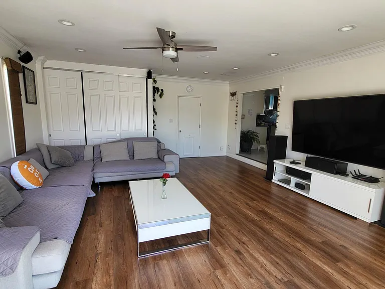 Large living room 2 - can be used as a media room. Enjoy your movies here , 400+ sqft can accommodate 20 guests easily watching movies etc.