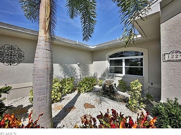 Front Garden area with pond and waterfall...
