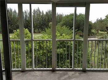 1st image of 3250 N Palm Aire Dr APT 405