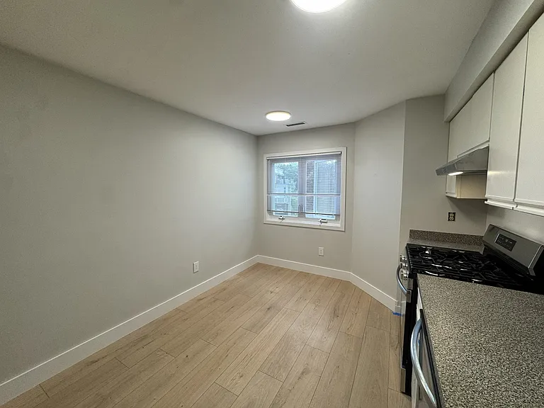 The kitchen has plenty of space for a dining room table or breakfast nook.