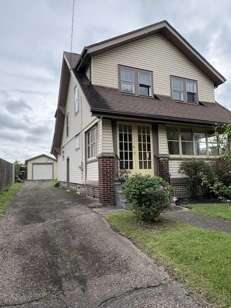 Beautiful 3BR/1.5BA Akron Home | Updated Kitchen | Garage | Enclosed Porch — Photo 3