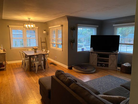 Living room and dining room with lots of natural light