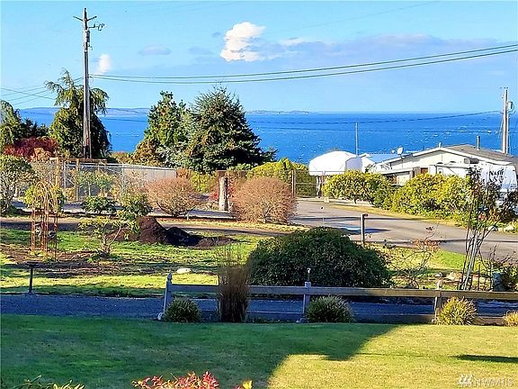 From the front deck with views of the Sound and along the west side..Sequim, Port Angeles, and beyond.