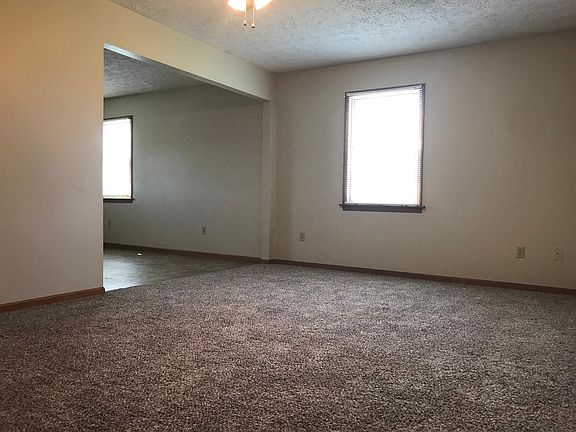 Living room looking into kitchen