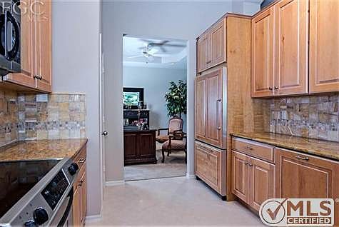 Kitchen leading into transition room or as formal dining