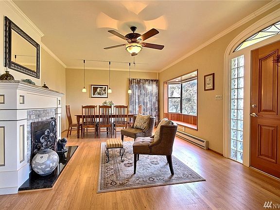 Enjoy the spacious living room with a wood burning fireplace.