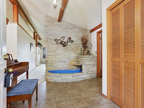 large foyer w/fish pond