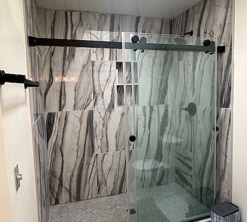 Master bath with natural sunlight via skylight