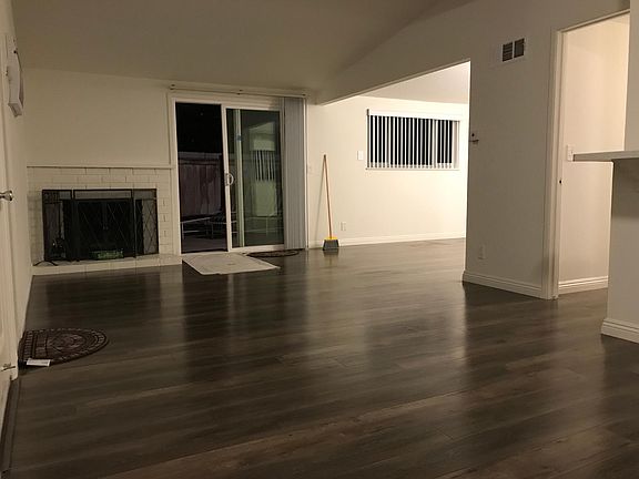 Fireplace, Laminated Wood Floors, Slider to Large Front Yard