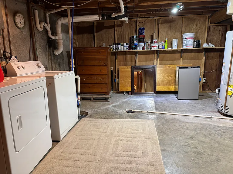 Laundry room in basement