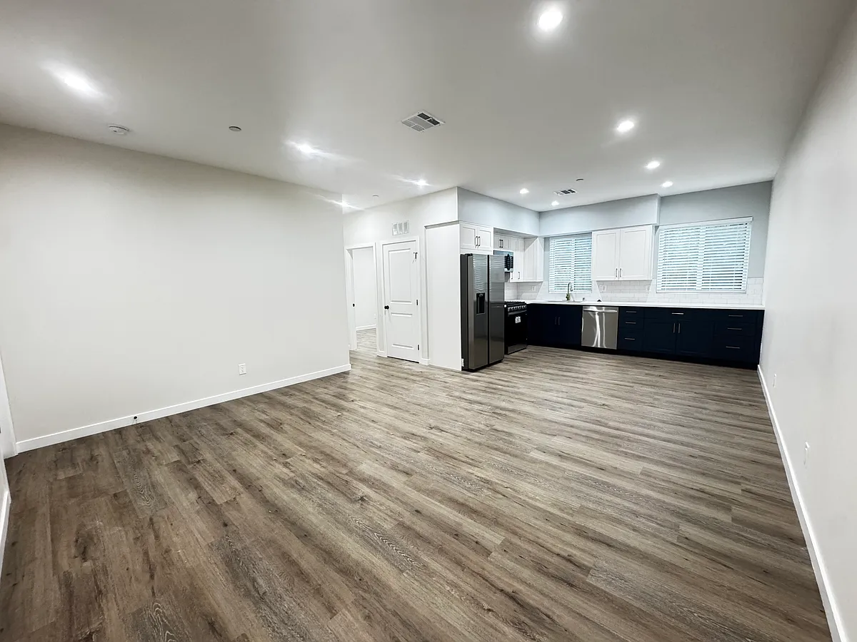 Spacious open concept living area with recessed lighting - 5637 Homeside Ave #5637