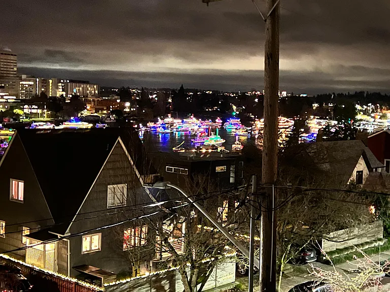 Views from upstairs at night.... The annual lake union boat parade cruises through here in Dec.