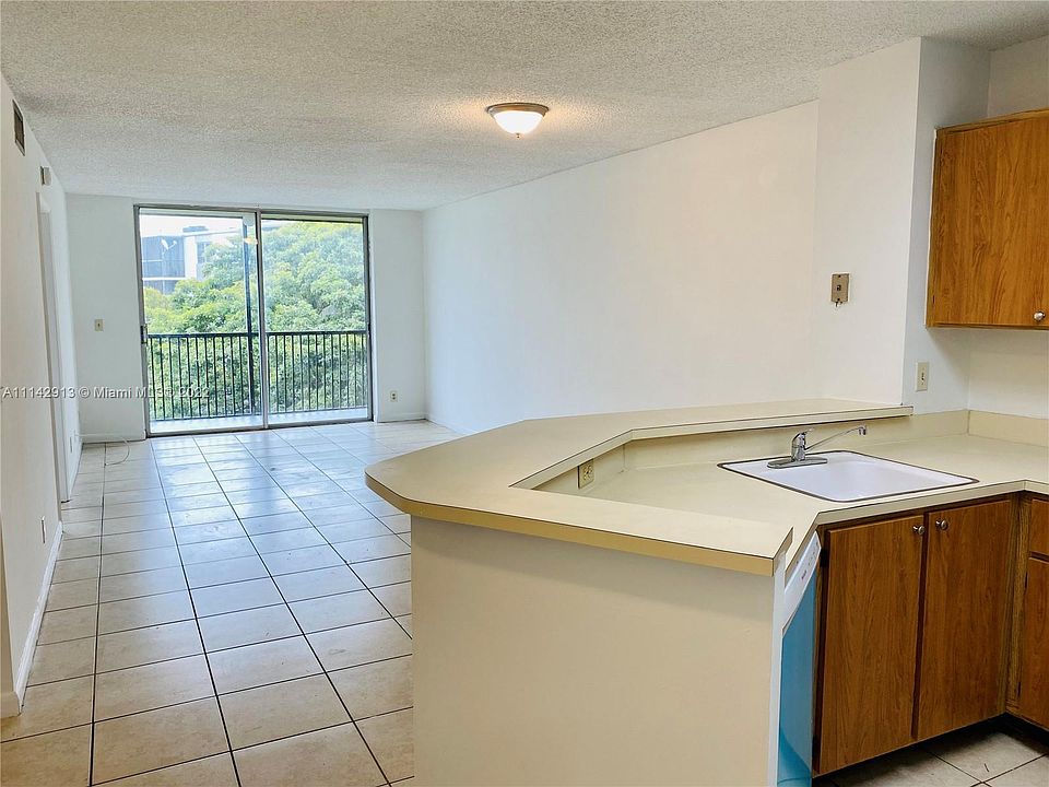 1st image of 8750 N Sherman Cir APT 407