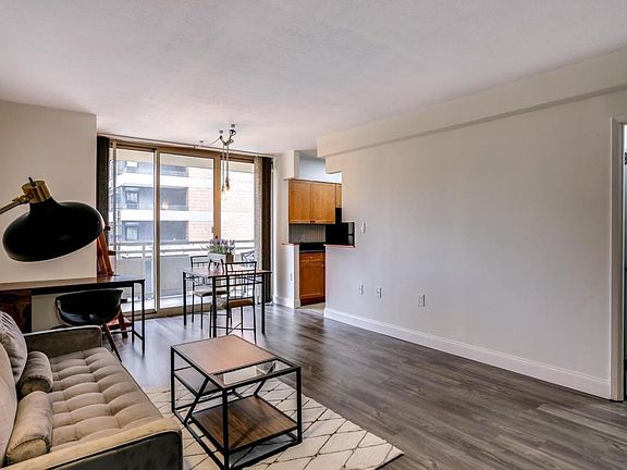 Living area w/ sliding doors to balcony