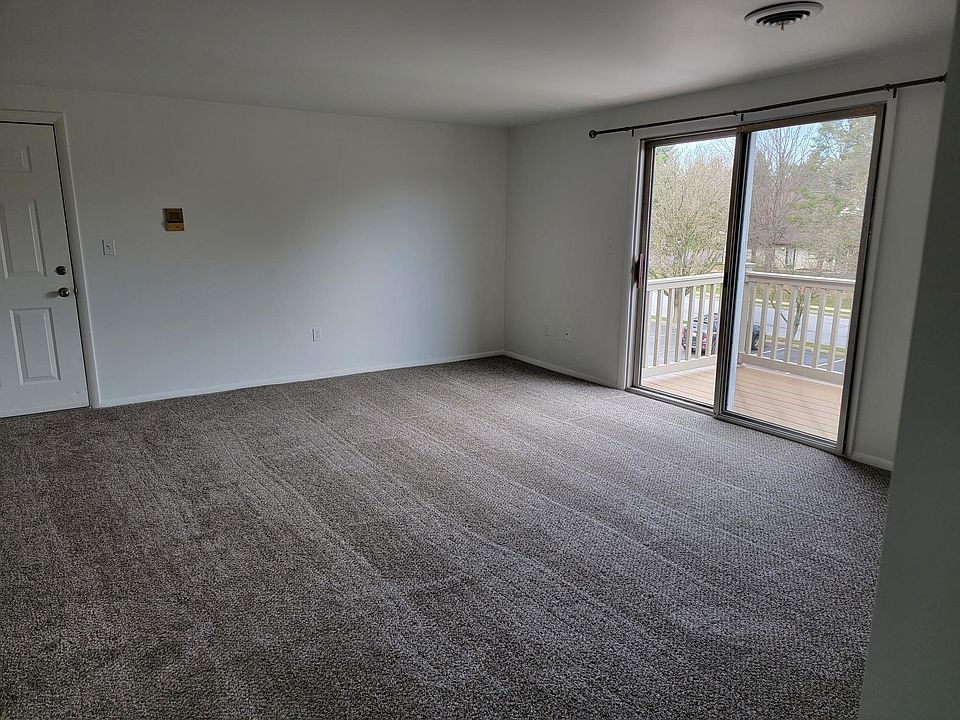 Living room looking from hallway. Patio doors to new balcony