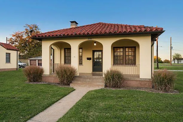 JNCO Cottage style home with 3 bedrooms, 1.5 baths. This home has beautiful hard wood floors, a spacious basement with laundry hook ups, large yard space surrounding the home, off street parking and a detached garage.
