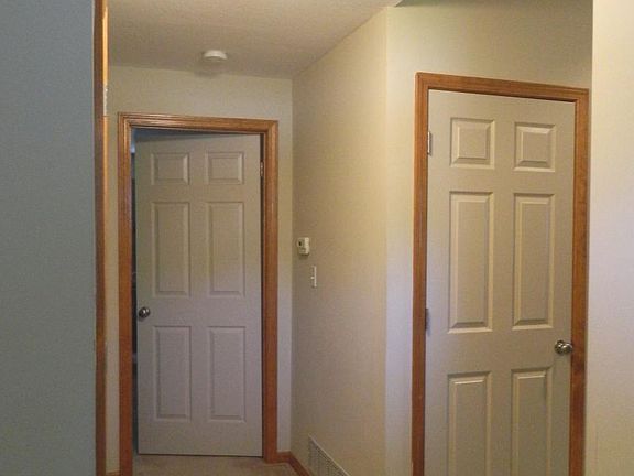 A spacious entry leads to the main floor center hall.