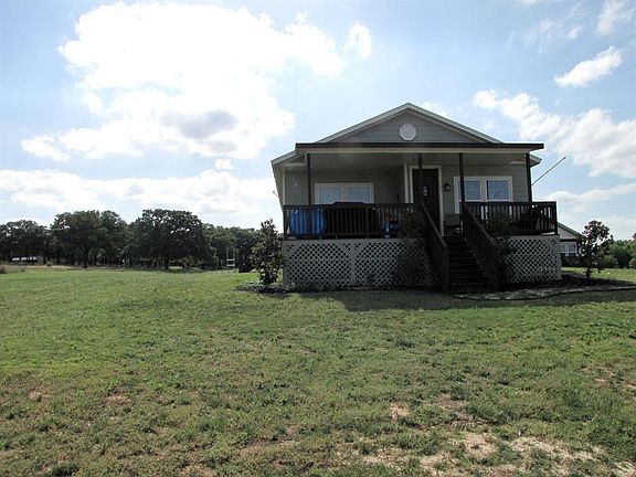 Closer view of the front home and land next door