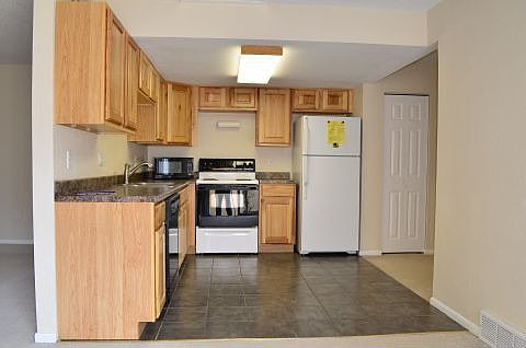 Tile flooring in kitchen area