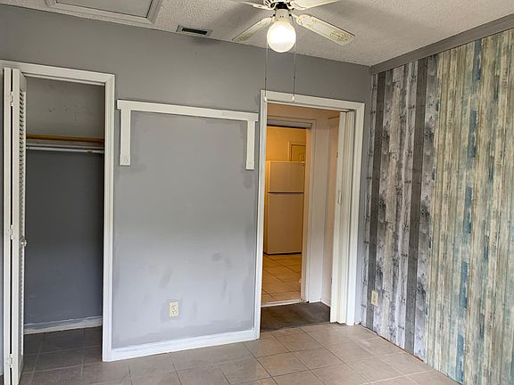 Living room with closet.