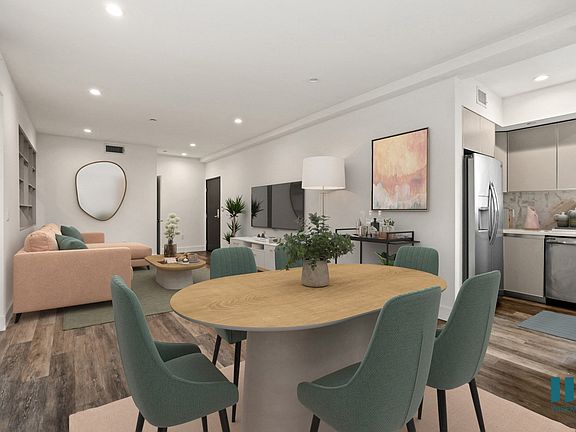 Kitchen, Dining, and Living Room with Vinyl Flooring and Recessed Lighting